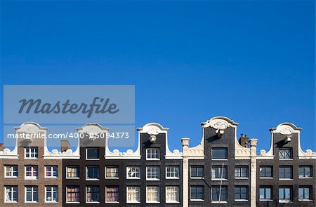 Façade of canal houses in Amsterdam, the Netherlands