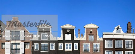 Façade of canal houses in Amsterdam, the Netherlands