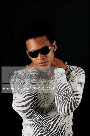 Portrait of young trendy african american male model posing isolated