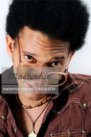 Portrait of young trendy african man with retro sunglasses
