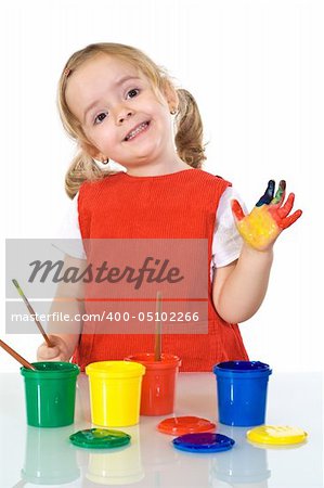 Happy little painter girl with smeary hand vawing - isolated