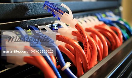 Network Cables in a Server Room with One Unplugged.  Networking Concept.