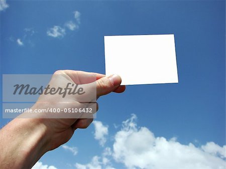 Hand holding the blank card