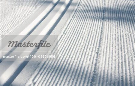 A nordic ski track set in the Callaghan Valley, site of the 2010 Winter Olympic Games.   Shallow depth of field allows for good placement of copy in the background.