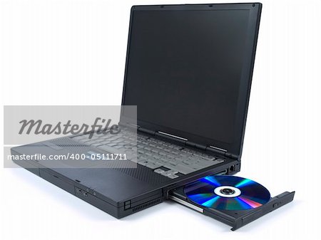 A black laptop with dvd in tray. Isolated over white background.