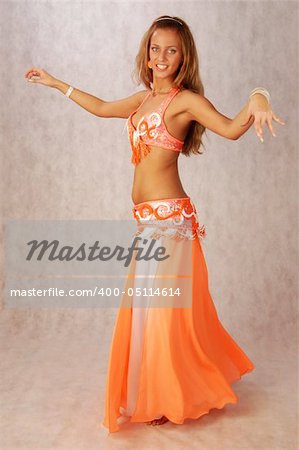 beautiful long hair blonde woman in arabic dance costume