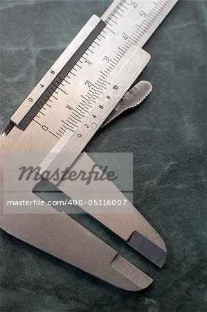 precision measurement tool made of steel, inches and millimeter, detail photo