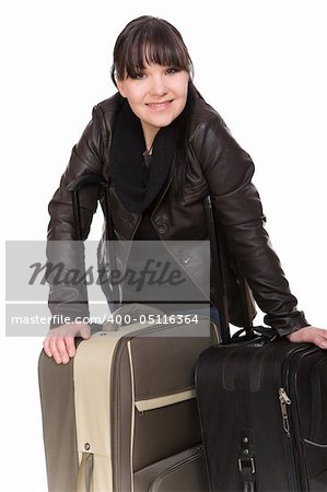 attractive brunette woman with suitcase. over white background