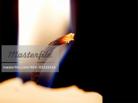 Burning candle closeup