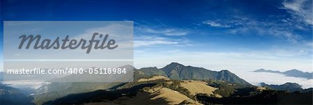 Beautiful panorama mountain landscape with blue sky.