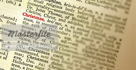 The meaning of the word CHRISTMAS highlighted in the dictionary. Shallow focus