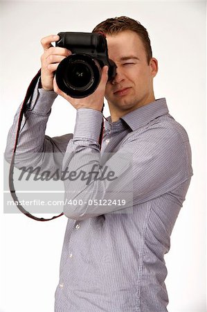 A young man taking pictures