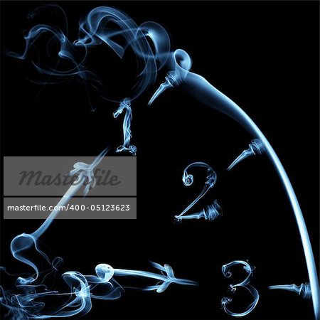 smoky clock on black background