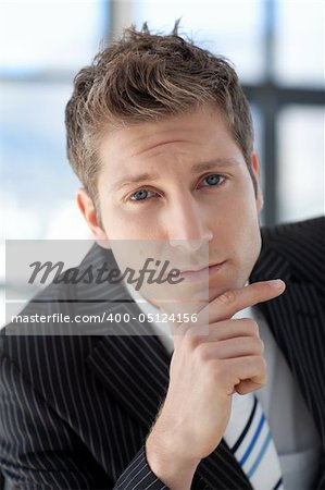 Attractive Businessman looking at camera