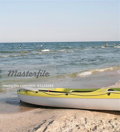 Canoe on an empty beach.