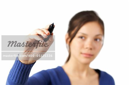 Casual young businesswoman or student writing with a black marker on virtual whiteboard. Isolated on white.