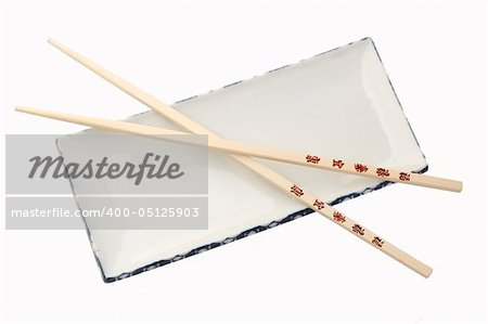 outline of chopsticks on a plate