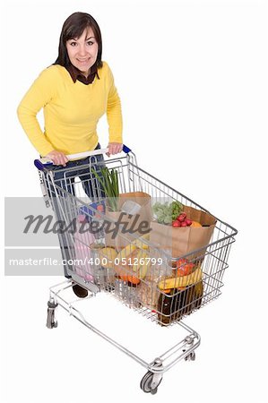 happy brunette woman with shopping cart. over white background