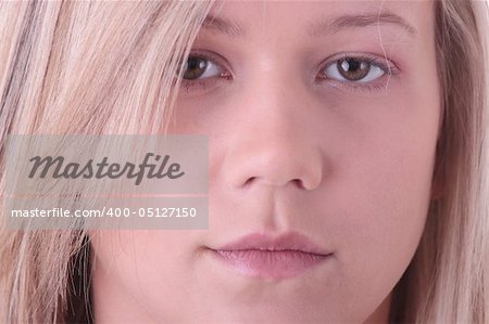 Teen blonde girl (student) portrait isolated on white background