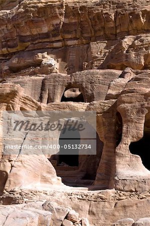 Tombs in Petra - Nabataeans capital city (Al Khazneh) , Jordan. Made by digging a holes in the rocks. Roman Empire period. Several bridges system.