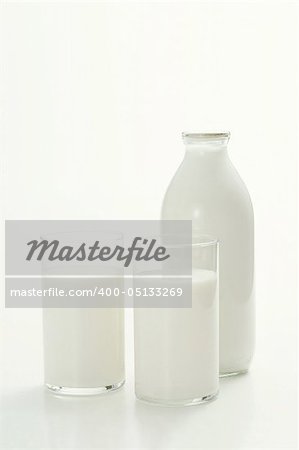 Fresh glasses of milk isolated over white background