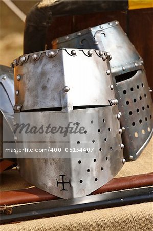close up of ancient metal helmet   background