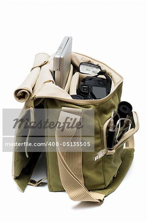 The camera, lens, flash and laptop in a bag