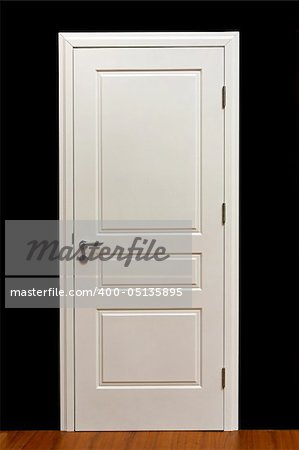 Closed white paint door in home interior