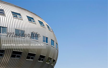 Fashion center in Almere; a modern curved office building