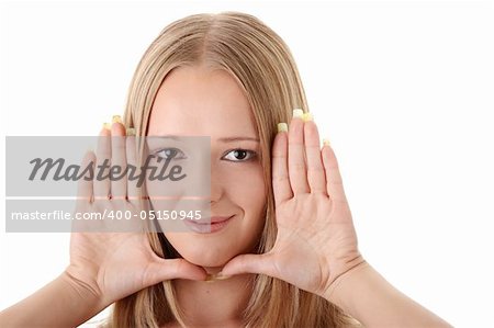 Young blond woman frame her face with hands