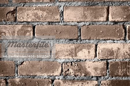 Brick wall of a building destroyed by time
