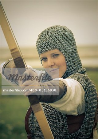 bows woman / medieval armor / historical story  / retro split toned