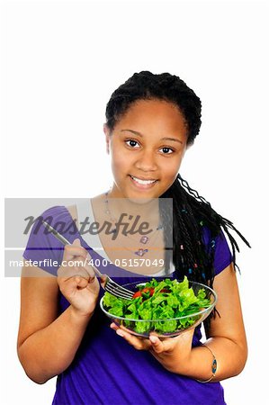 Isolated portrait of black teenage girl with salad bowl