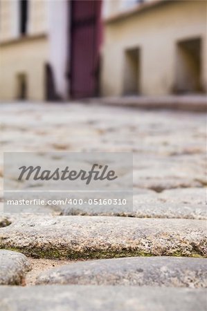 Paving stones. Small street in old town.