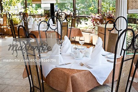 closeup of classically served table in expensive restaurant