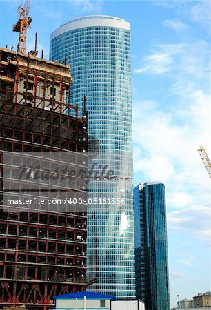Construction of skyscrapers from glass, a steel and concrete of a complex of the international business centre Moscow-city, Moscow, Russia