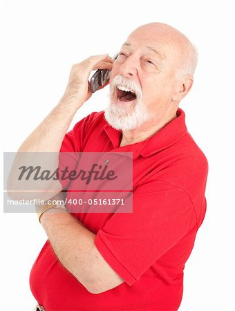 Senior man talking on his cellphone laughs out loud.  Isolated on white.
