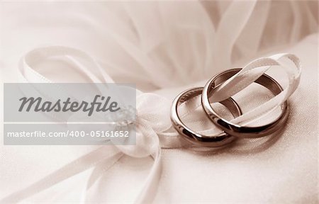 Wedding rings on a satiny fabric