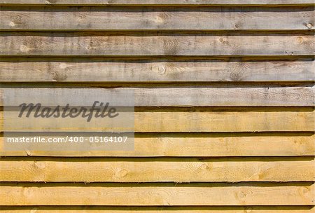 Plank background of old weathered wood of two colour