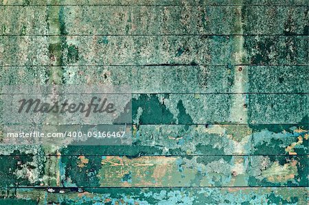 Grunge uneven rural wooden green surface background