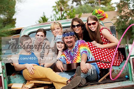 Groovy Group in the Back of Truck Laughing