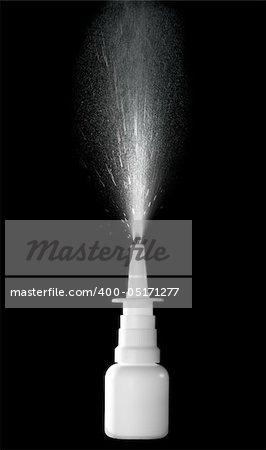 Stock image of nasal spray bottle while spraying over black background