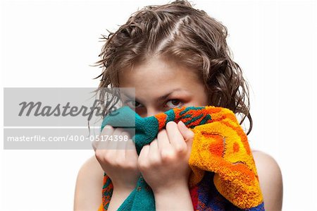 Making look younger girl with wet hair looks from for towel on white background