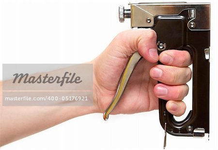 Professional staple gun in the hand isolated over white background