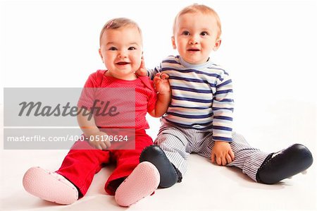 Portrait of cheerful  baby friends