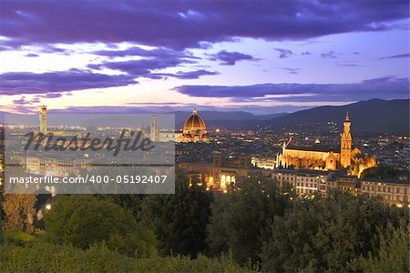 HDR image of beautiful sunset in Florence. View at Santa Maria del Fiore cathedral, Palazzo Vecchio and Basilica of Santa Croce