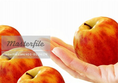 Red-yellow apple in hand on a white background