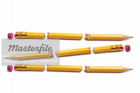 Broken Pencils on Isolated White Background