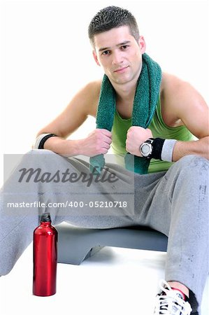 young adult man relax and drink water with sweat on body