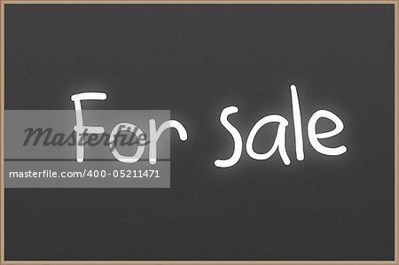 Chalkboard with wooden frame and the text For Sale
